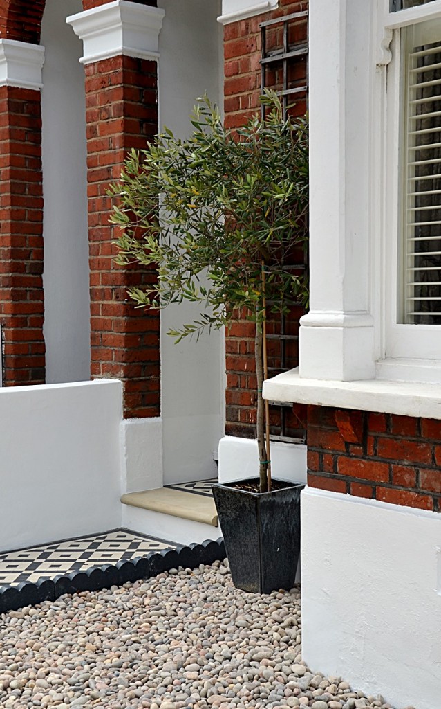 Front garden wall painted white metal wrought iron rail ...