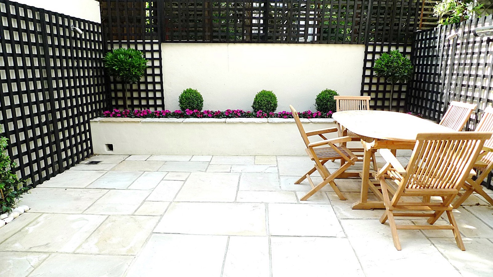 Sandstone paving patio raised beds classic modern planting ...