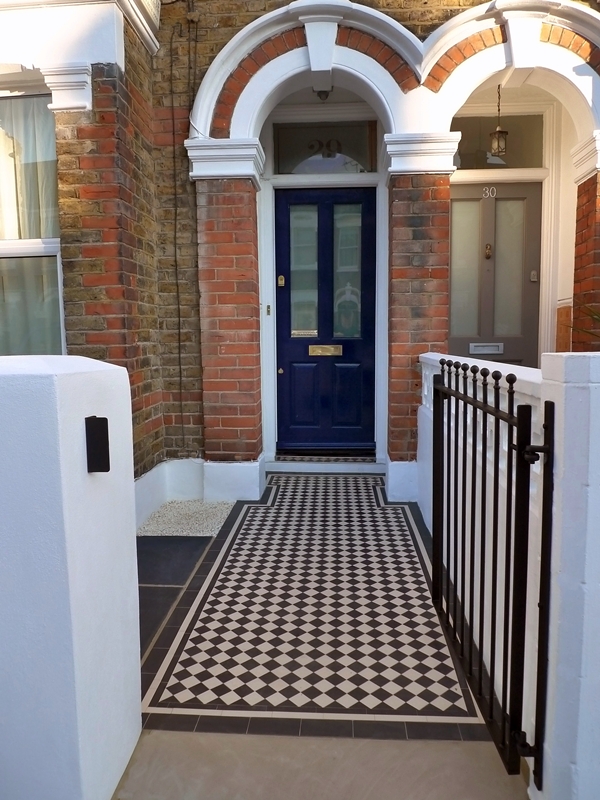 metal-rail-and-gate-with-black-and-white-mosaic-tile-path-london.JPG