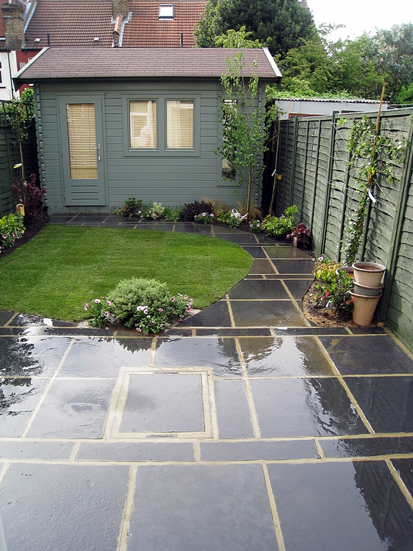black-limestone-paving-small-garden-london-patio-builder.JPG