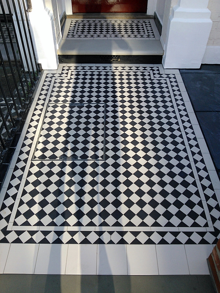 black and white victroain mosaic tile path london