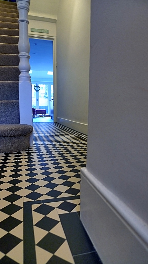 classic victorian edwardian black and white mosaic hallway tile path London