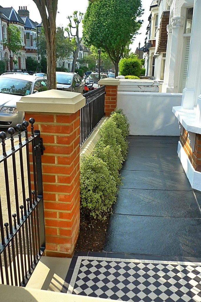 victorian front garden design london red rubber brick wall with yellow composite pier cap and mosaic tile path and paving