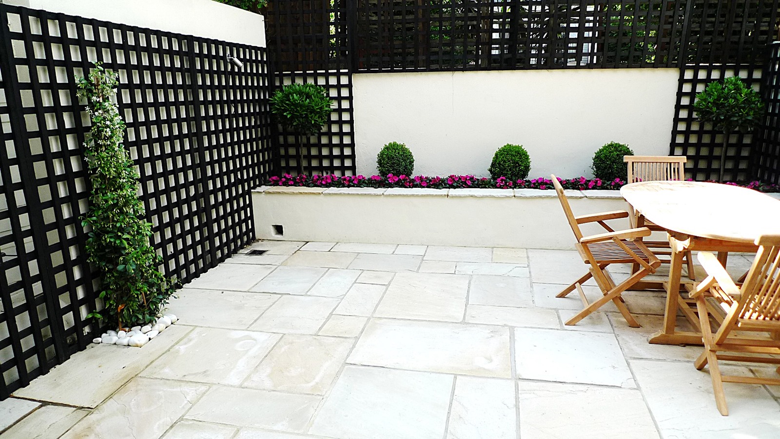 Sandstone paving patio  raised beds classic modern  planting 
