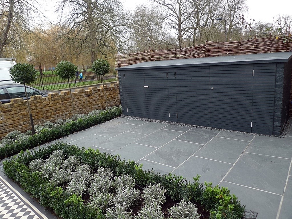 Topiary storage bin grey tile planting London brick garden wall Wandsworth Battersea Clapham