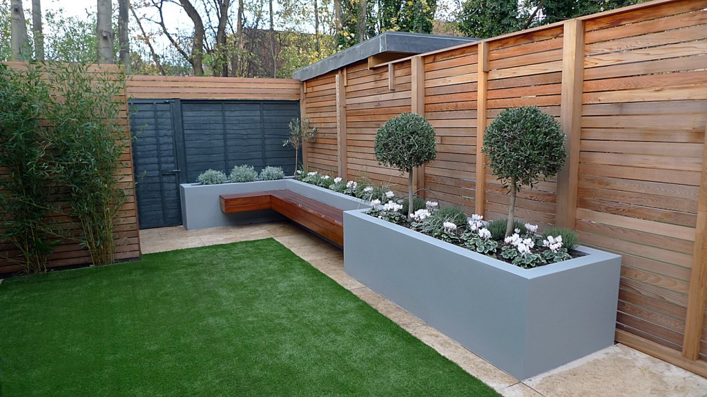 Topiary grey walls fake grass fence London formal Fulham Chelsea Wandsworth Dulwich modern design