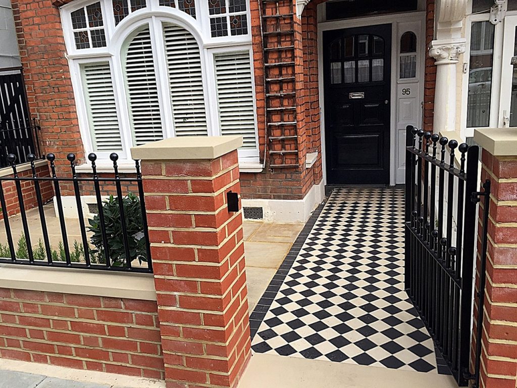Victorian Classic Mosaic black and white red brick wall metal gate rails paving London Clapham Balham Wandsworth