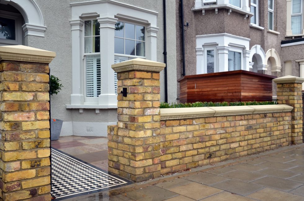Brick garden wall Imperial Yellow stock cap coping bespoke storage