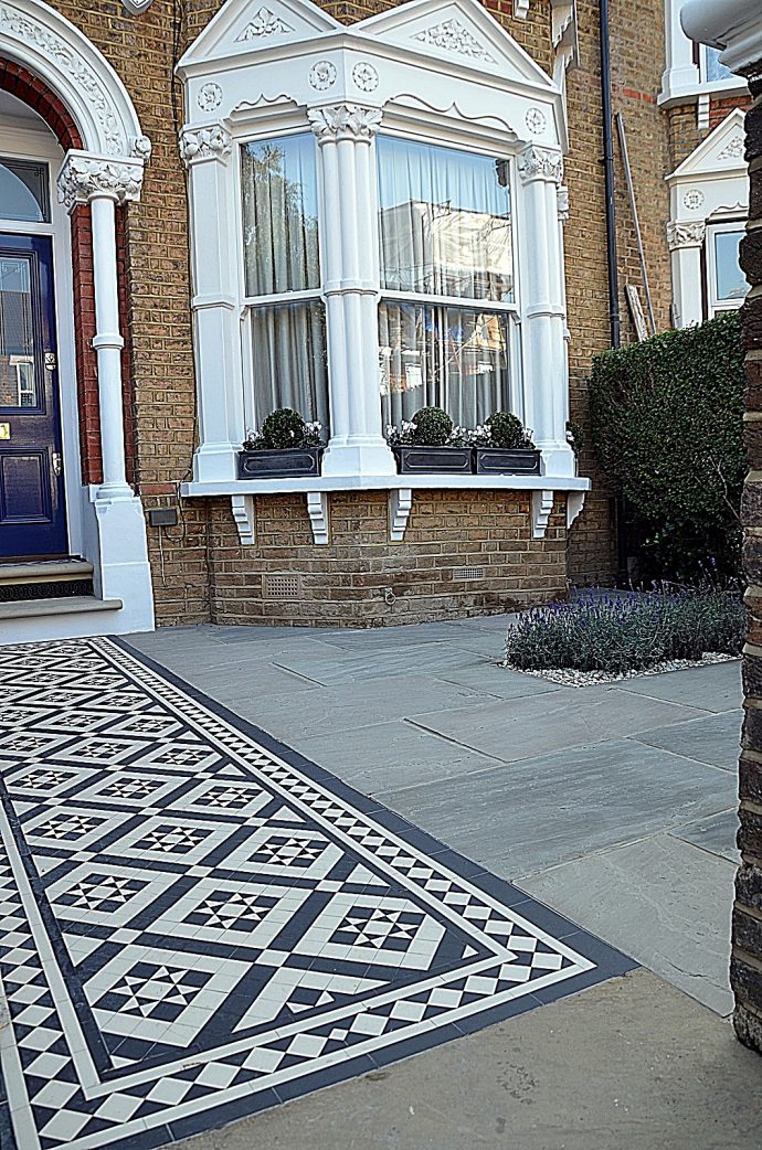 Brick garden wall cap coping white colour iron gate rails path paving