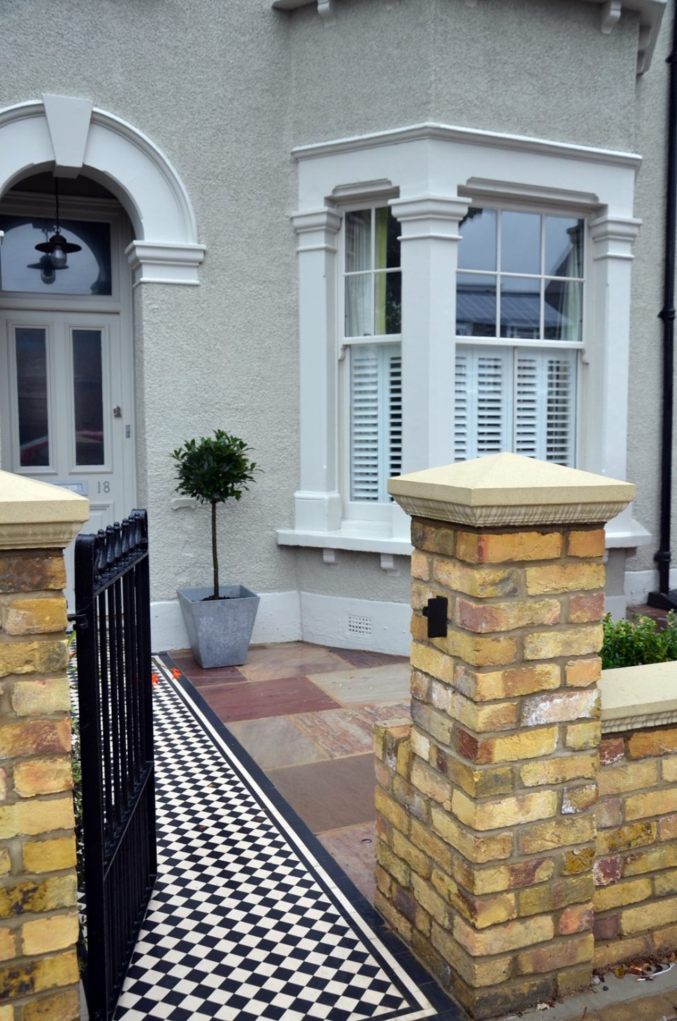 Brick garden wall Imperial Yellow stock cap coping bespoke storage